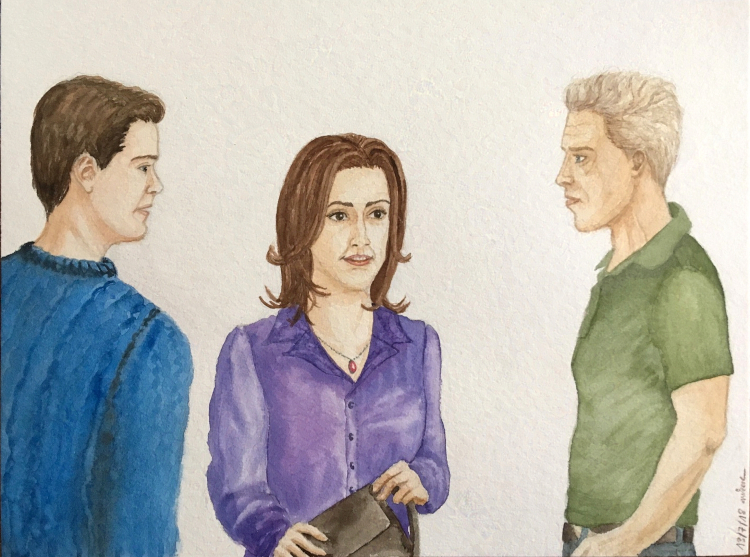 three people in discussion, a woman in the middle